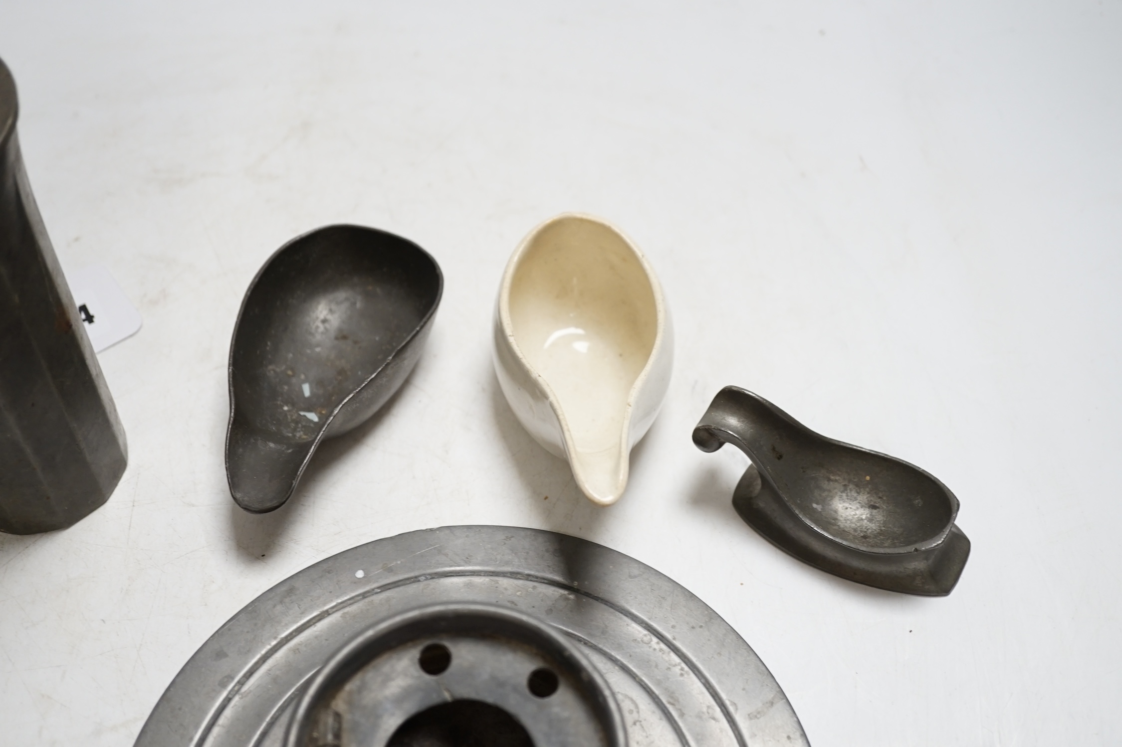 A small group of early pewter and a ceramic pap boat, etc, largest 15.5cm high. Condition - varies, mostly fair